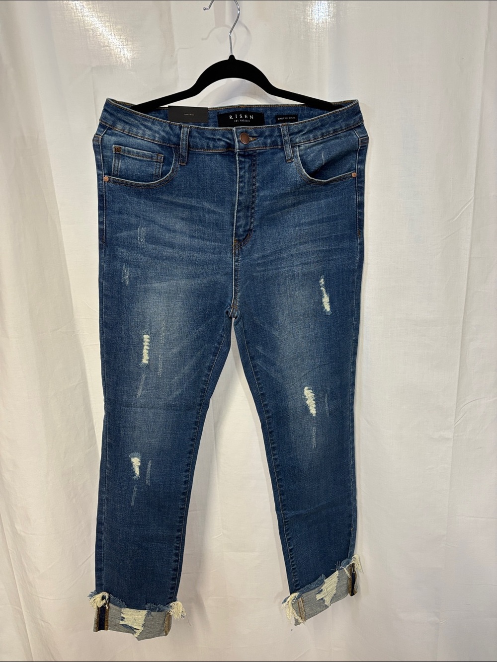 Women's Risen Distressed Dark Blue Stretch Jeans. Size 13, waist 31.